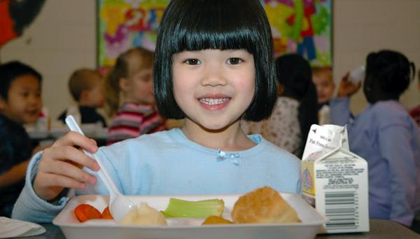 Student enjoys a school lunch 